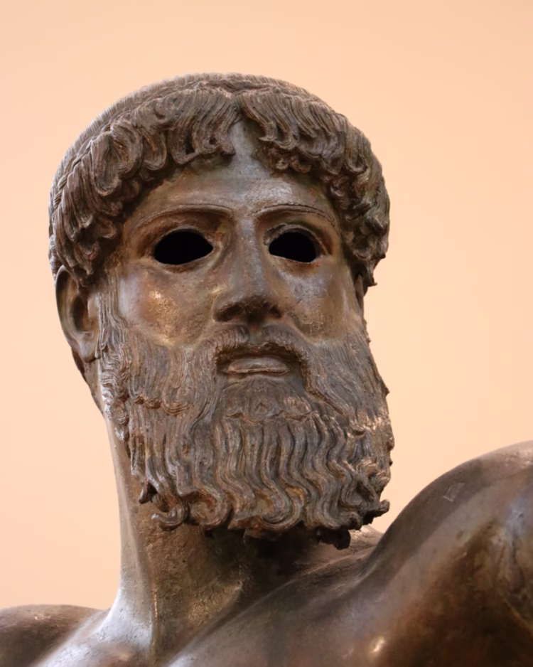 Greek Bronze Statue of Zeus of Artemision Head close up on display in Athens