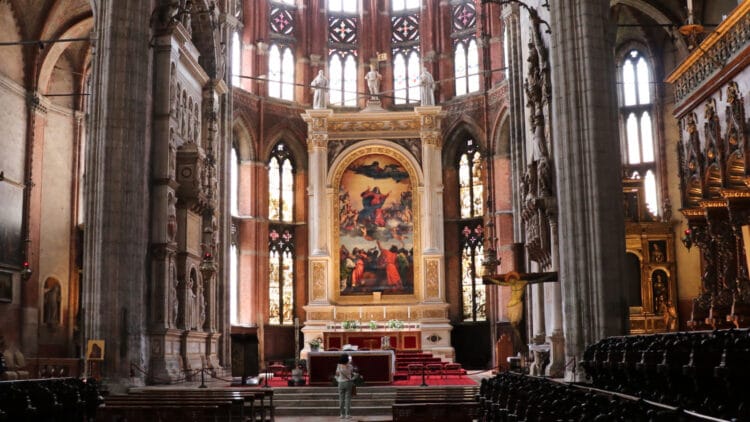Visit the Gothic Frari Church to see some of the best art in Venice, including Titian's Assumption of the Virgin.